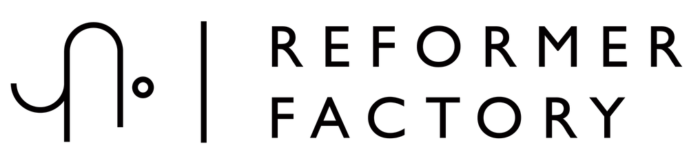 The image shows the black silhouette of a train with a locomotive at the front pulling several rectangular passenger cars in a row, moving from left to right.